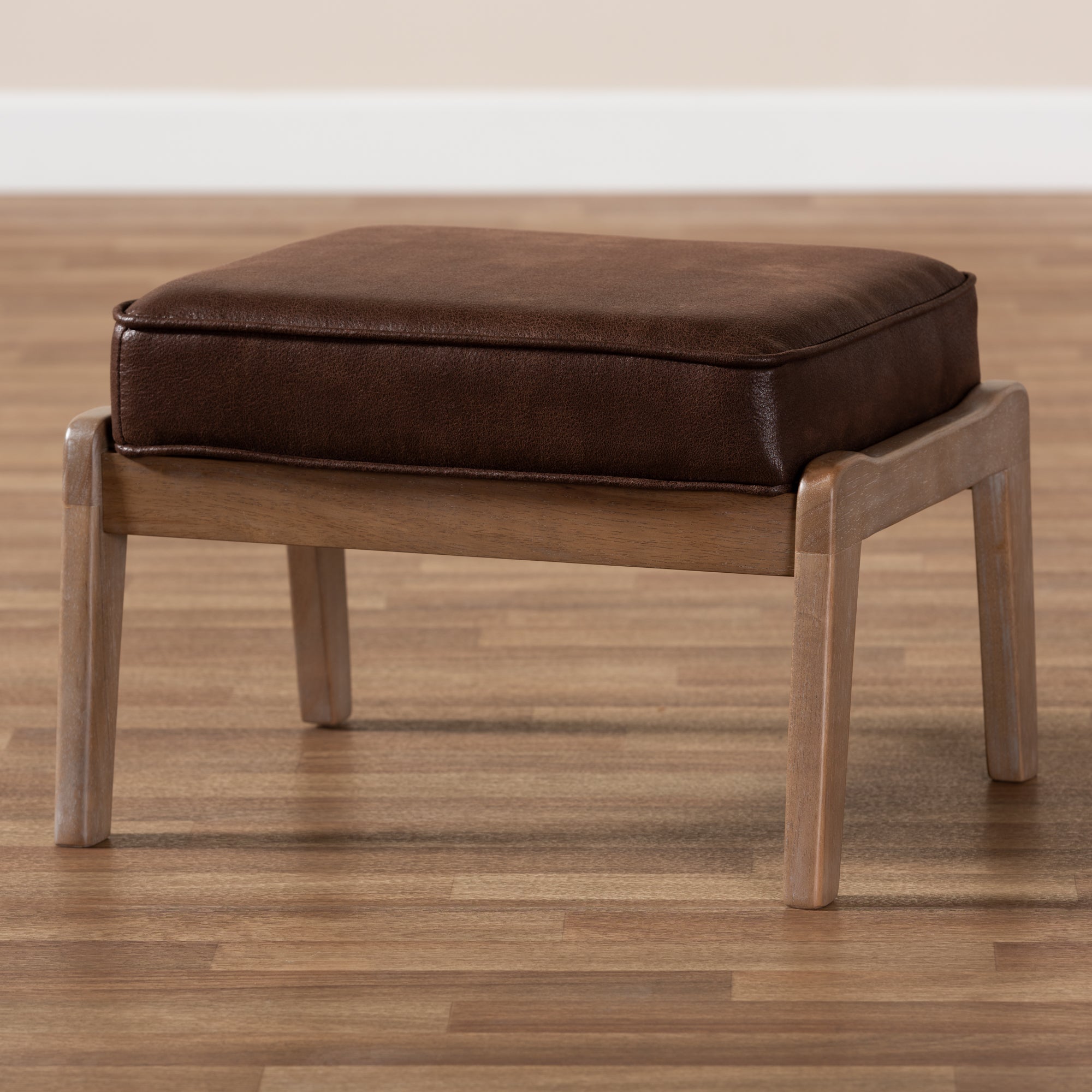 Sigrid Mid-Century Modern Dark Brown Faux Leather Effect Fabric Upholstered Antique Oak Finished Wood Ottoman