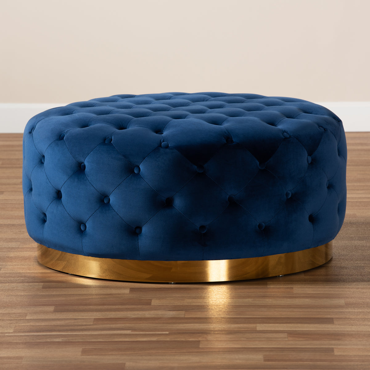 Sasha and Royal Blue Velvet Fabric Upholstered Gold Finished Round Cocktail Ottoman