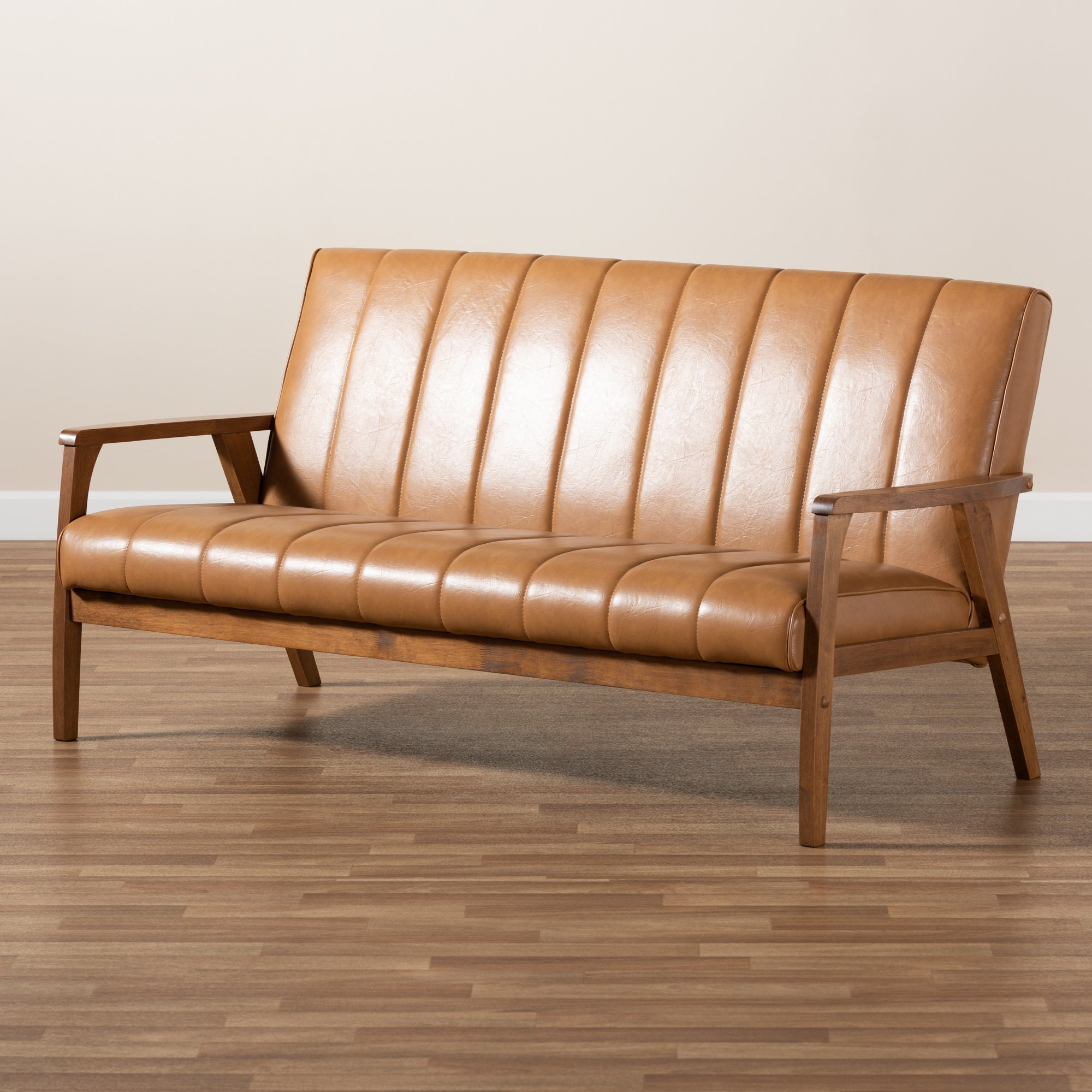 Nikko Mid-century Modern Tan Faux Leather Upholstered and Walnut Brown finished Wood Sofa
