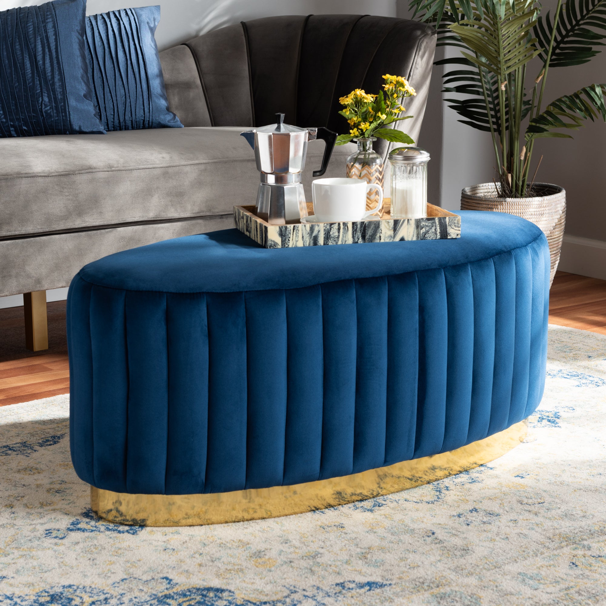 Kirana Navy Blue Velvet Fabric Upholstered and Gold PU Leather Ottoman