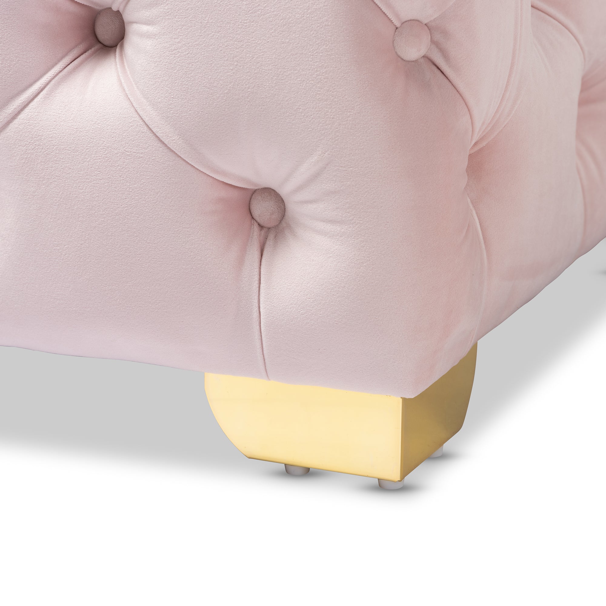 Avara Light Pink Velvet Fabric Upholstered Gold Finished Button Tufted Ottoman