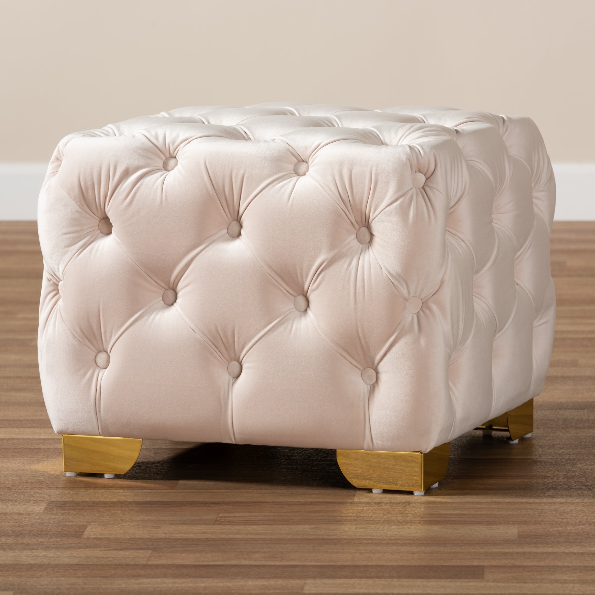 Avara Light Beige Velvet Fabric Upholstered Gold Finished Button Tufted Ottoman