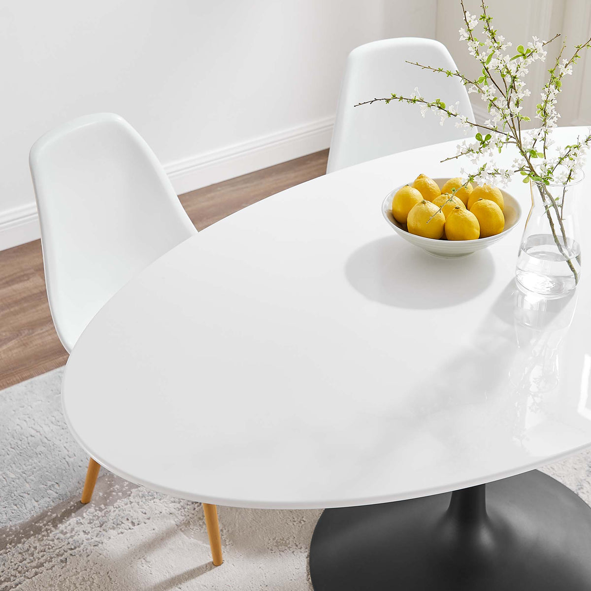 Lippa 60" Oval Wood Dining Table, Black White