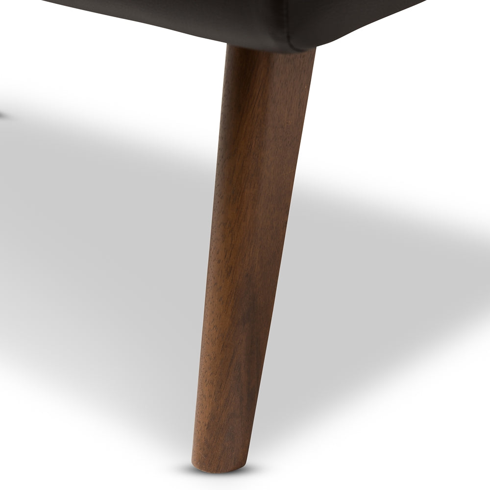 Annetha Mid-Century Modern Black Faux Leather Upholstered Walnut Finished Wood Ottoman