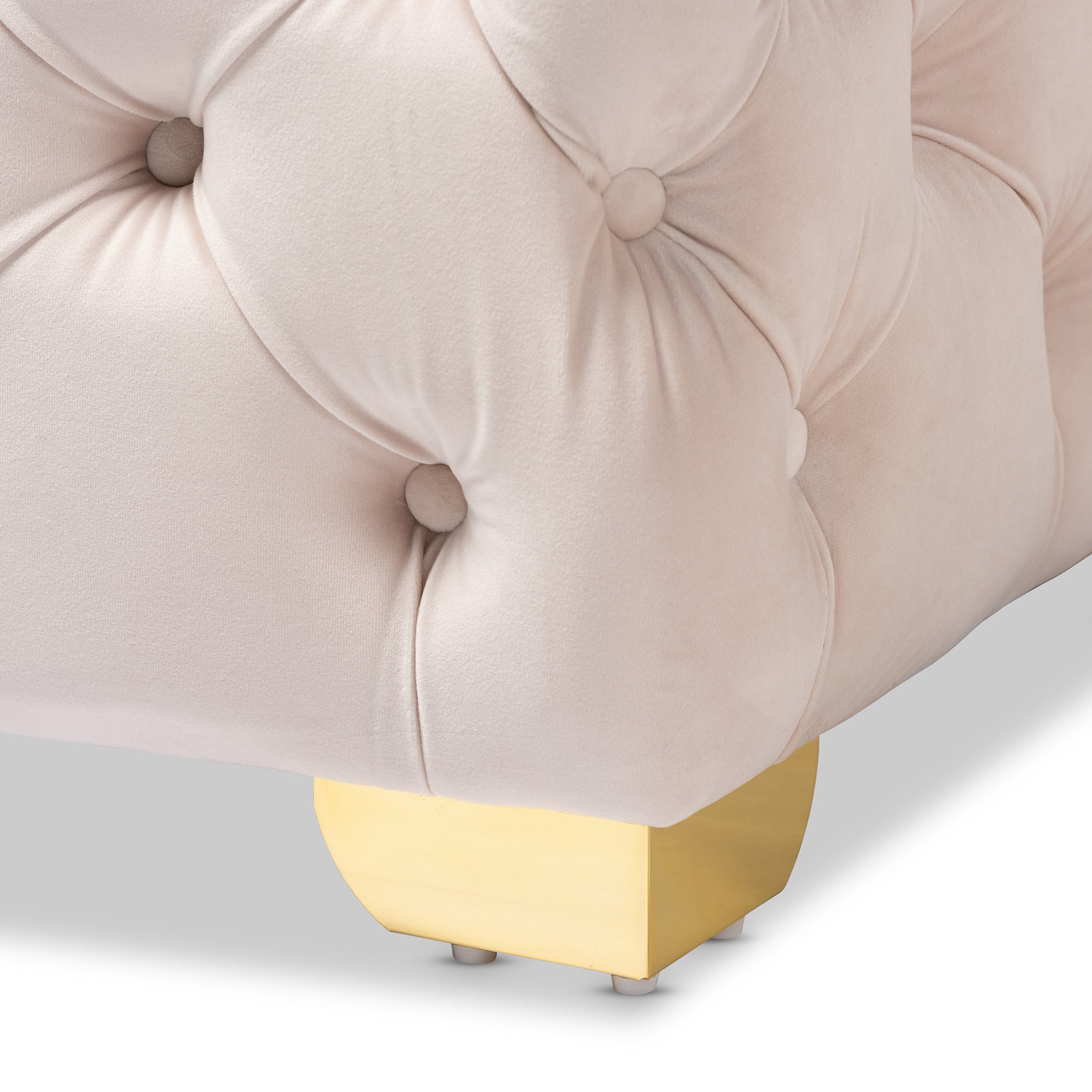 Avara Light Beige Velvet Fabric Upholstered Gold Finished Button Tufted Ottoman