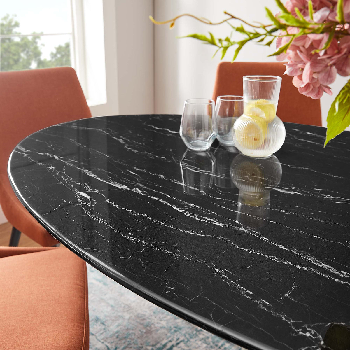 Lippa 60" Oval Faux Marble Dining Table, Black Black